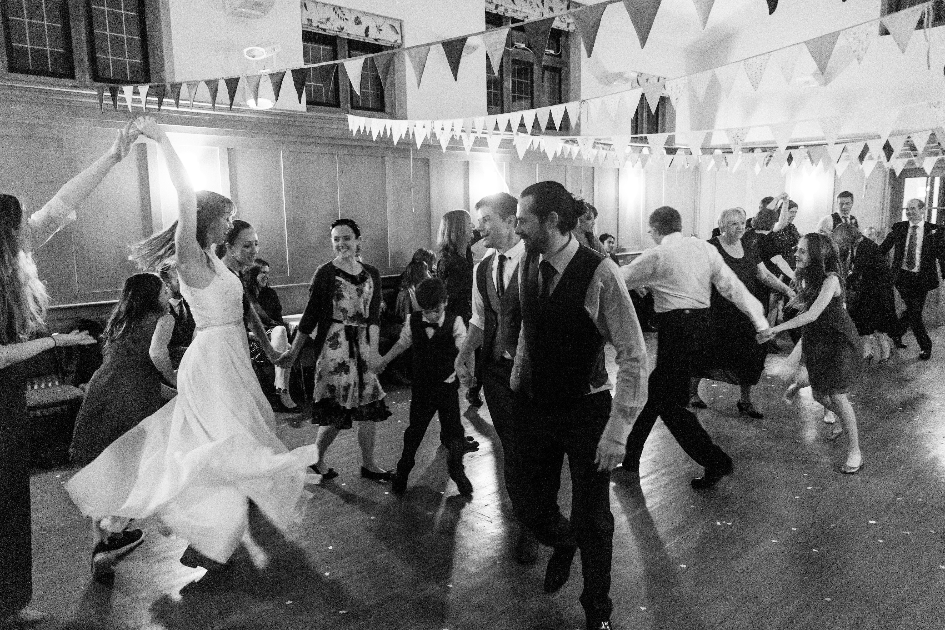 Black and white photo of people dancing.